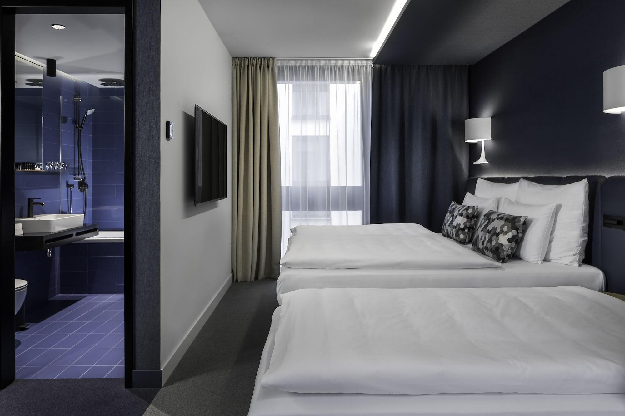 Hotel Urban Creme Praga Esterno foto A room at the hotel