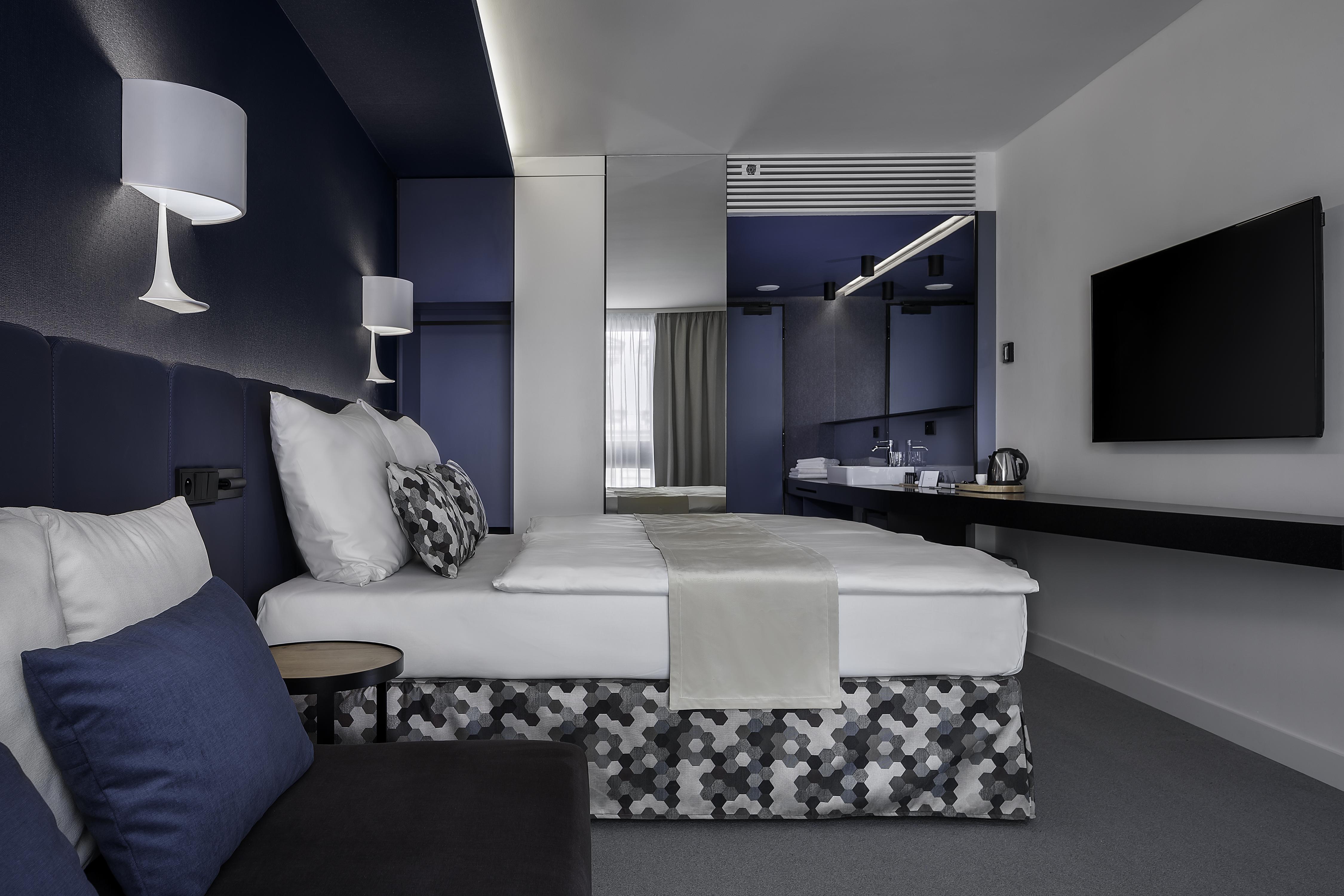 Hotel Urban Creme Praga Esterno foto A room at the hotel