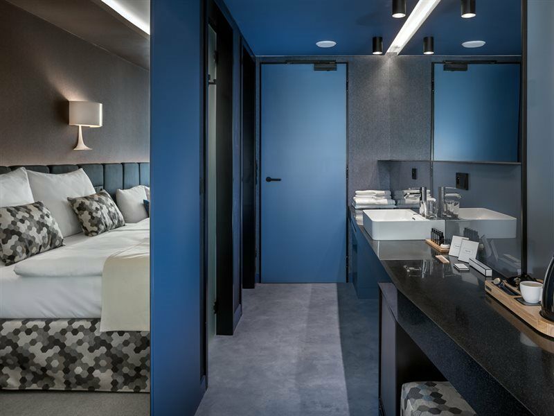 Hotel Urban Creme Praga Esterno foto A room at the hotel